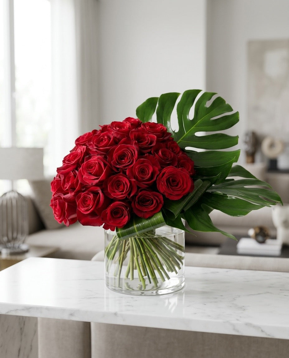 Luxury Red Rose Arrangement with Monstera Leaves